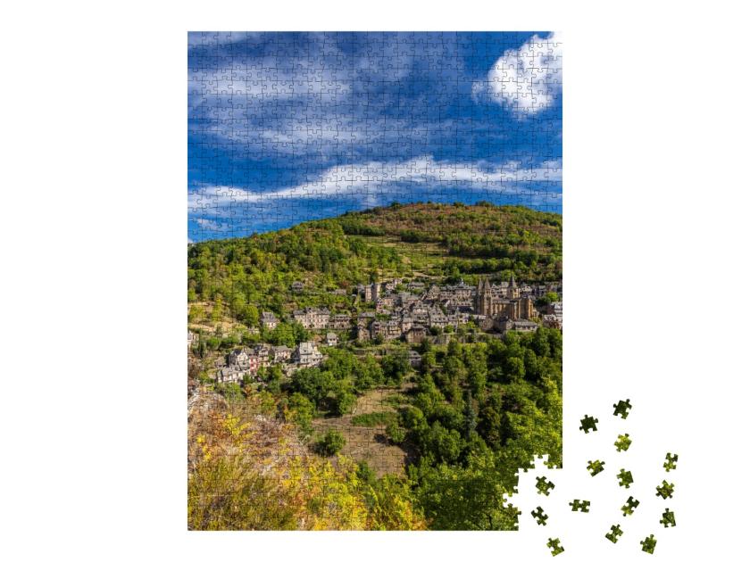 Puzzle de 1000 pièces « Village UNESCO de Conques-en-Rouergue dans le département de l'Aveyron, France »