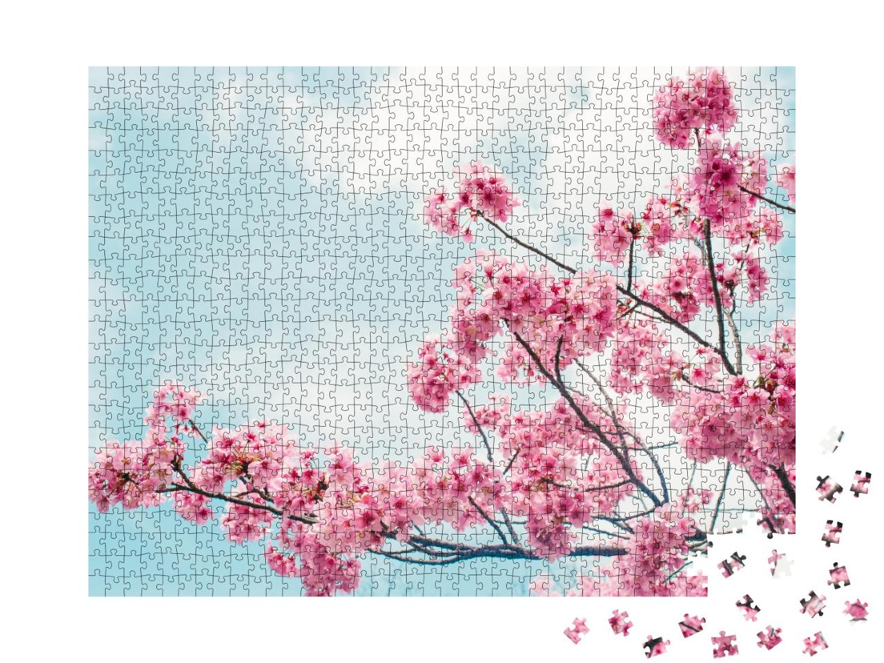 Puzzle de 1000 pièces « De charmantes branches de cerisier en fleurs sous un ciel bleu »