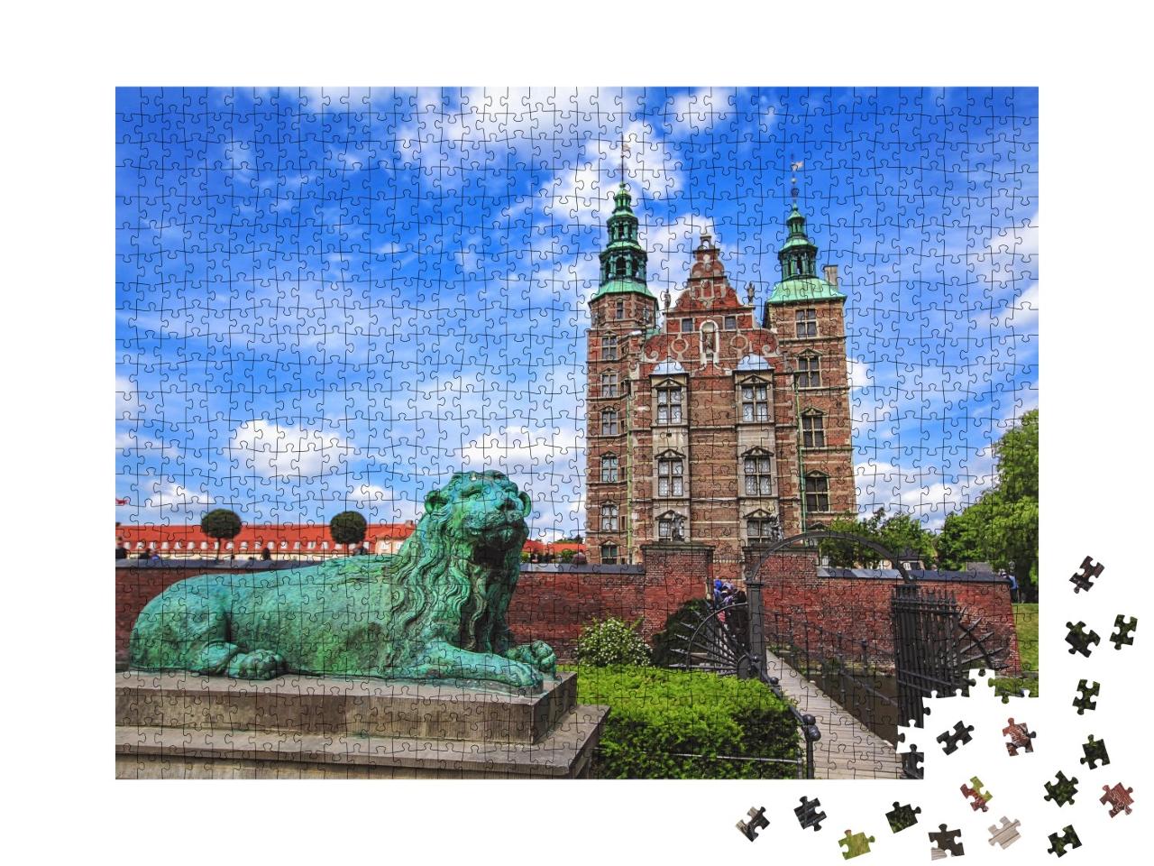 Puzzle de 1000 pièces « Sculpture du lion au château de Rosenborg sous un vaste ciel bleu »