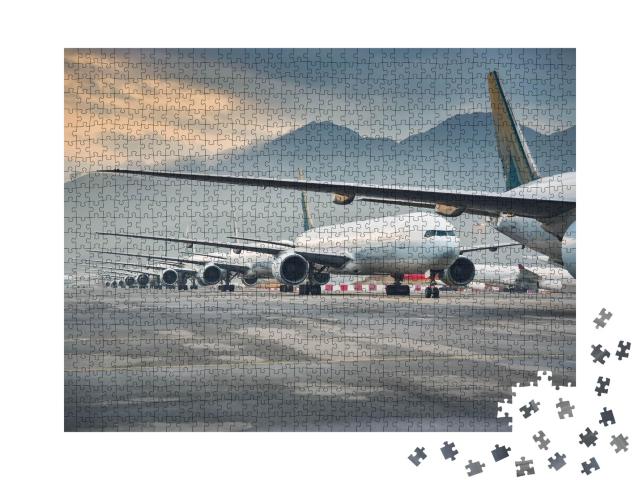 Puzzle de 1000 pièces « Flotte d'avions en stationnement »