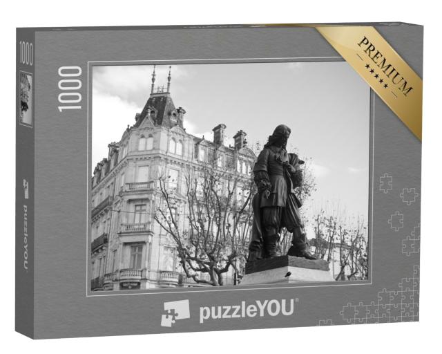 Puzzle de 1000 pièces « la statue de Paul Riquet dans les ruelles de Béziers l'après-midi »