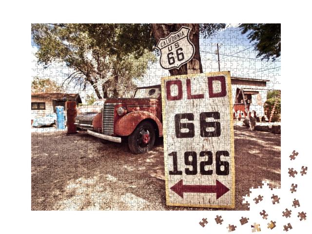 Puzzle de 1000 pièces « Voitures rouillées et panneaux de la Route 66 »