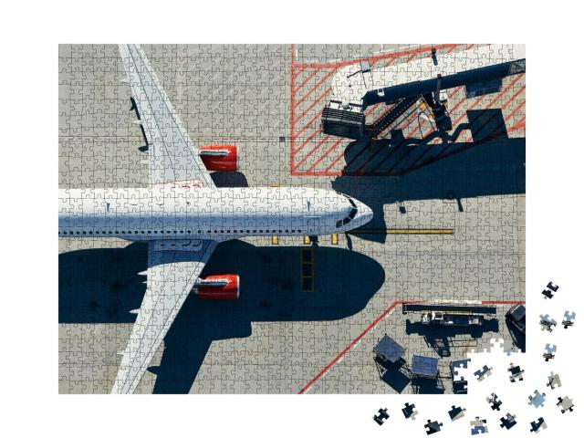 Puzzle de 1000 pièces « Avion à la porte du terminal »