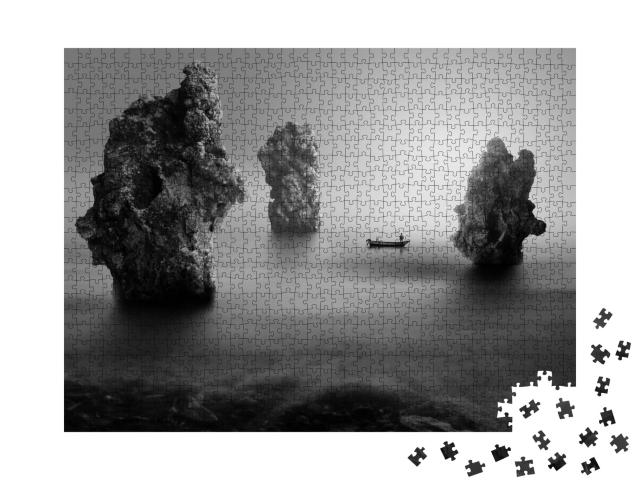 Puzzle de 1000 pièces « Pêcheur solitaire entre des rochers marins »