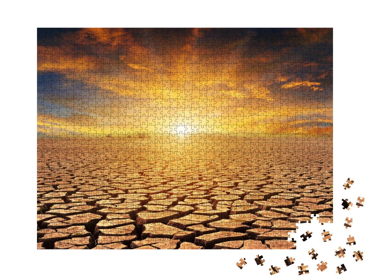 Puzzle de 1000 pièces « Coucher de soleil orange sur un désert de pierres »