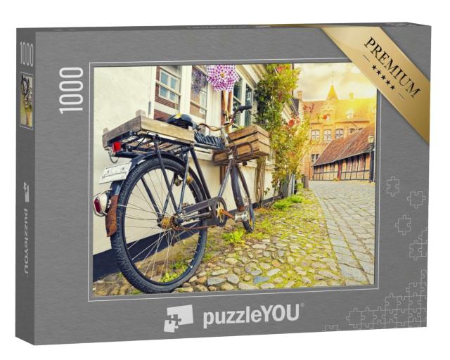Puzzle de 1000 pièces « Vélo vintage devant le mur d'une maison au coucher du soleil à Ribe »