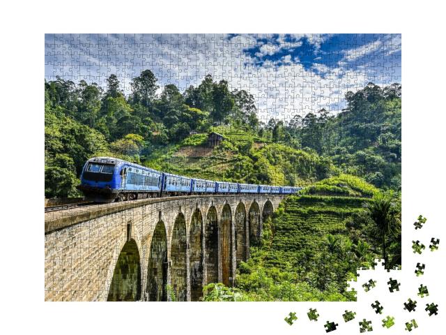 Puzzle de 1000 pièces « Pont de chemin de fer sur un paysage de montagne verdoyant »
