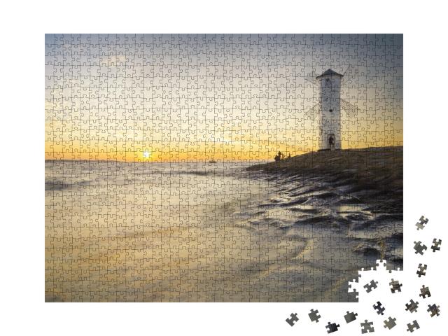 Puzzle de 1000 pièces « Phare avec des ailes de moulin à vent sur la mer Baltique en Pologne »