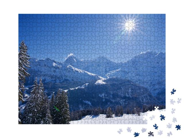 Puzzle de 1000 pièces « Paysage hivernal avec soleil en forme d'étoile, Mürren, Suisse »
