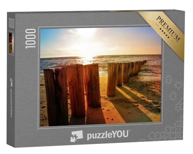 Puzzle de 1000 pièces « Épis en bois sur la plage de la mer du Nord au coucher du soleil »