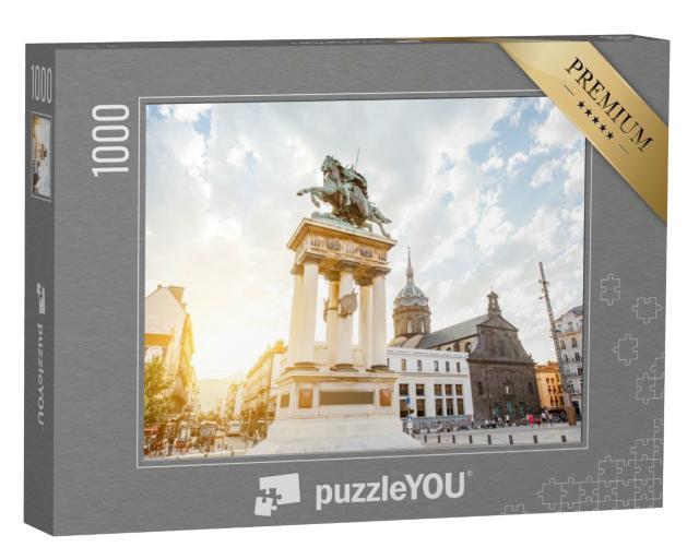 Puzzle de 1000 pièces « Place de la Jaude avec statue au coucher du soleil dans la ville de Clermont-Ferrand »