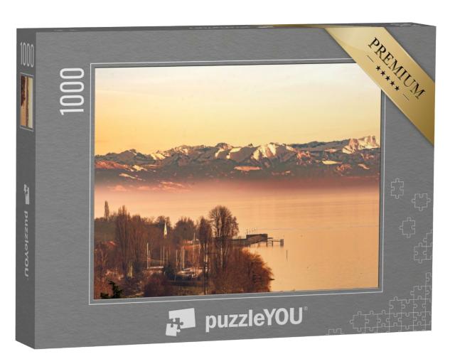 Puzzle de 1000 pièces « Lumière du soir sur le lac de Constance avec les Alpes suisses »