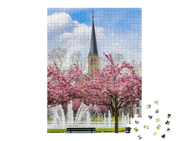 Puzzle de 1000 pièces « La place Wilson aux couleurs du printemps et ses cerisiers japonais en fleur. »
