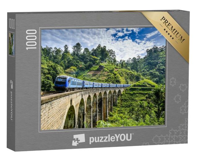 Puzzle de 1000 pièces « Pont de chemin de fer sur un paysage de montagne verdoyant »