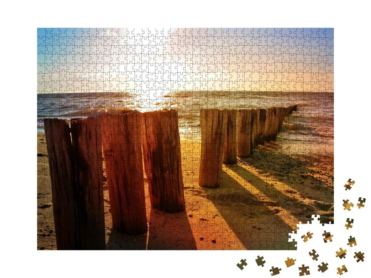Puzzle de 1000 pièces « Épis en bois sur la plage de la mer du Nord au coucher du soleil »