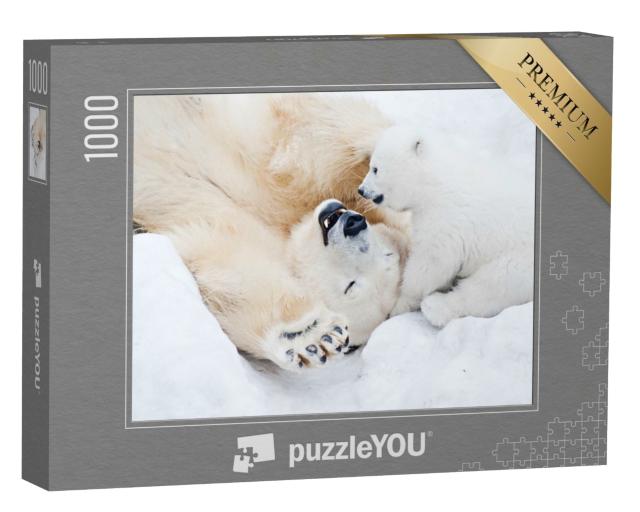 Puzzle de 1000 pièces « Une ourse polaire joue dans la neige avec son petit garçon »