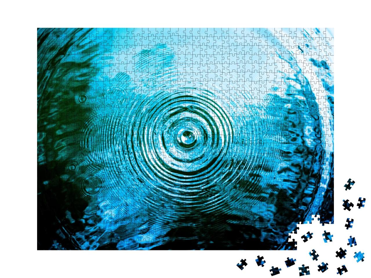 Puzzle de 1000 pièces « Gros plan sur des anneaux d'eau bleus »