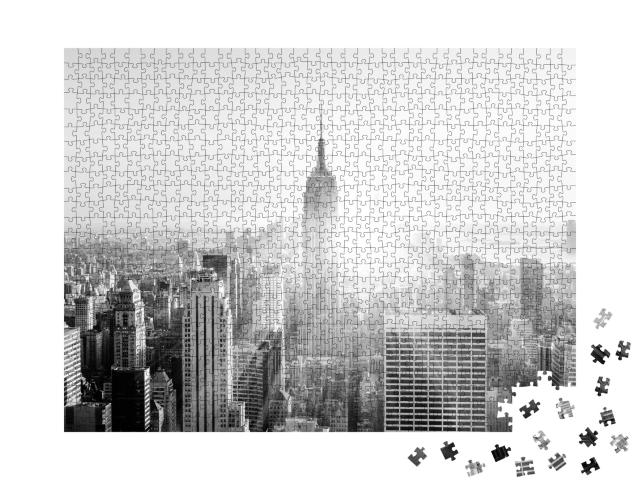 Puzzle de 1000 pièces « New York City : Manhattan avec l'Empire State Building illuminé »