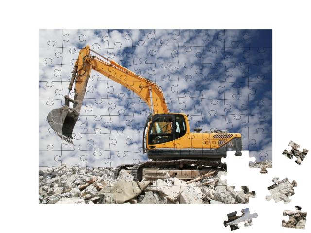 Puzzle de 100 pièces « Une pelleteuse creuse le sol pour les fondations »