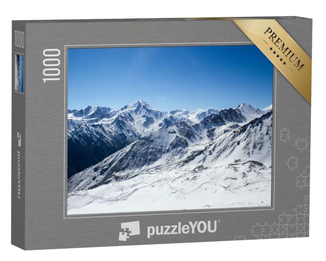 Puzzle de 1000 pièces « Route dans les montagnes enneigées du Kazakhstan »