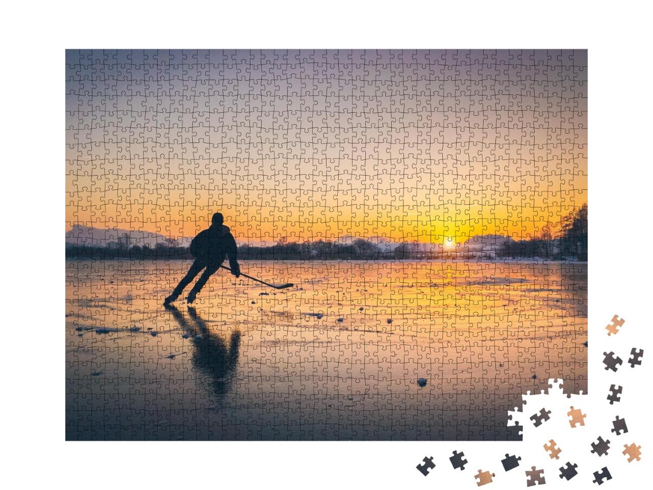 Puzzle de 1000 pièces « Silhouette d'un jeune joueur de hockey sur glace sur un lac gelé »