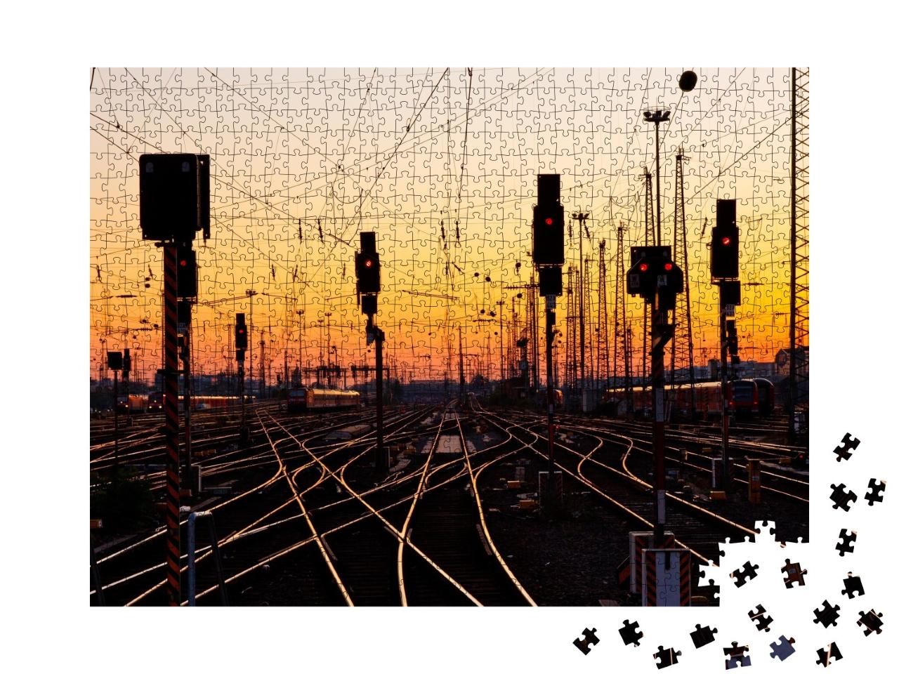 Puzzle de 1000 pièces « Rails de chemin de fer dans une grande gare au coucher du soleil »