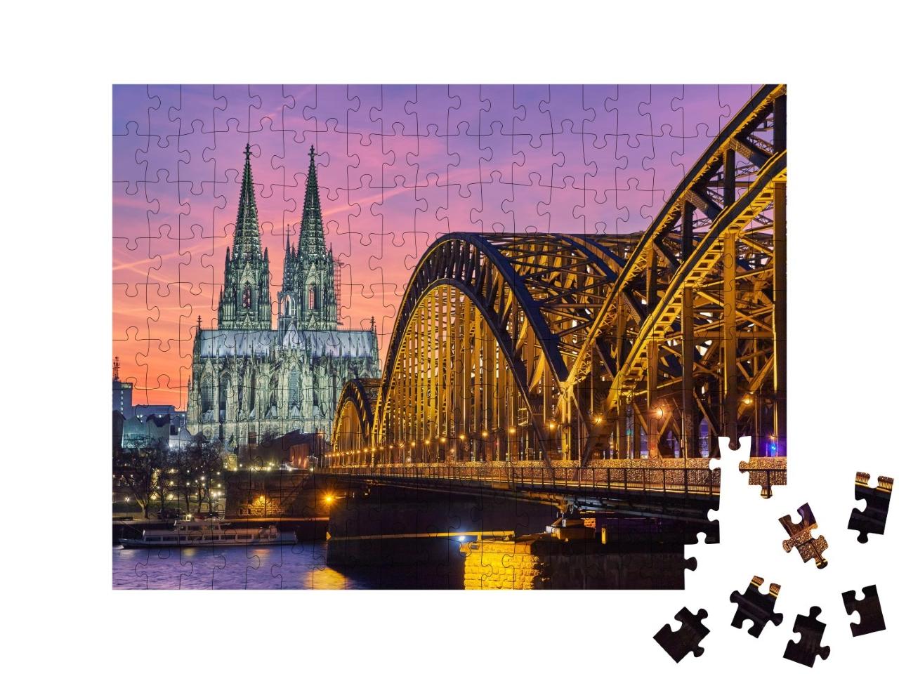 Puzzle de 200 pièces « La cathédrale de Cologne et le pont Hohenzollern au coucher du soleil »