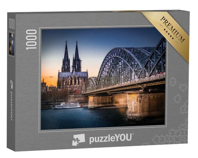 Puzzle de 1000 pièces « Patrimoine mondial de l'UNESCO : la cathédrale de Cologne, au premier plan le pont Hohenzollernbrücke »