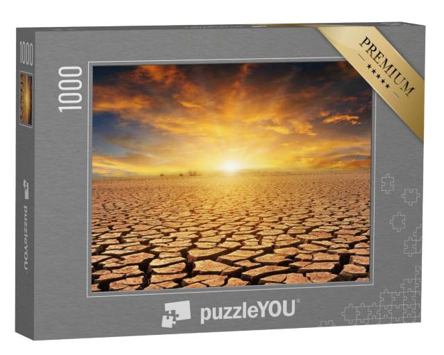 Puzzle de 1000 pièces « Coucher de soleil orange sur un désert de pierres »