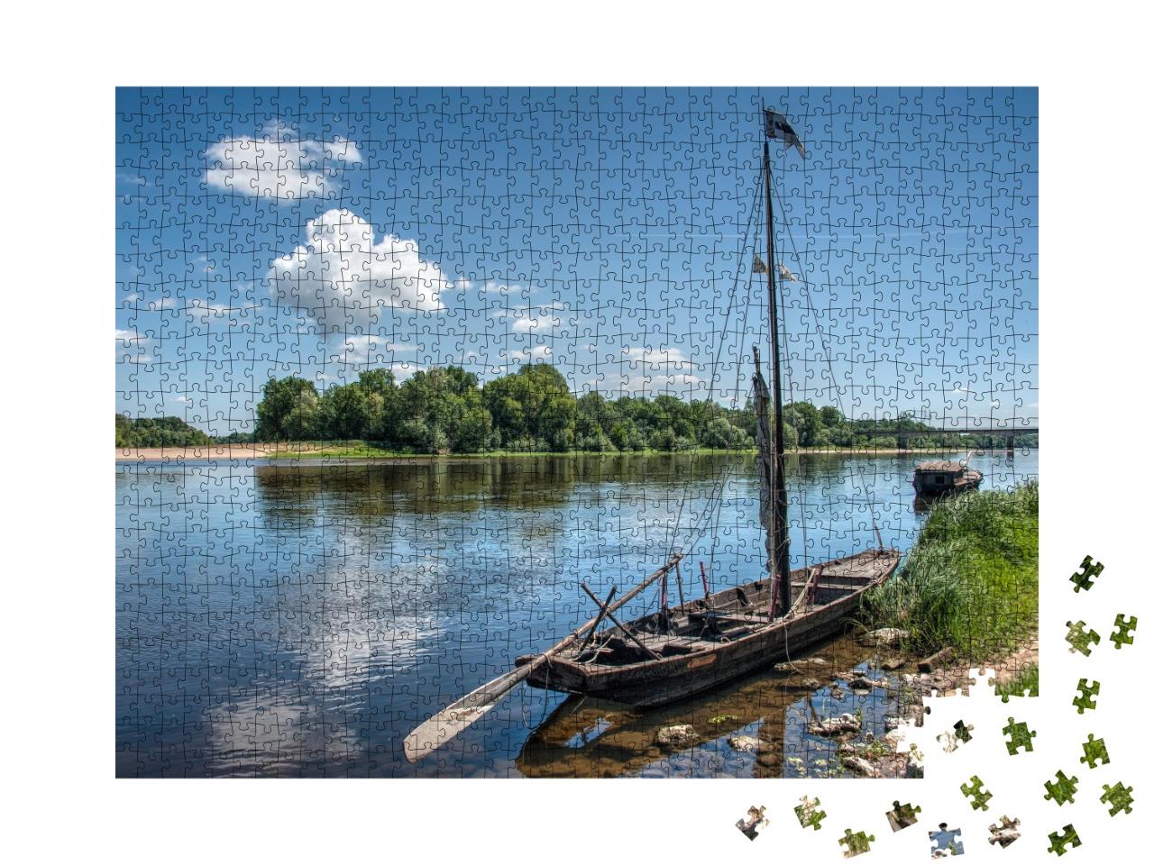 Puzzle de 1000 pièces « Petit bateau de pêche sur la Loire, dans l'ouest de la France »