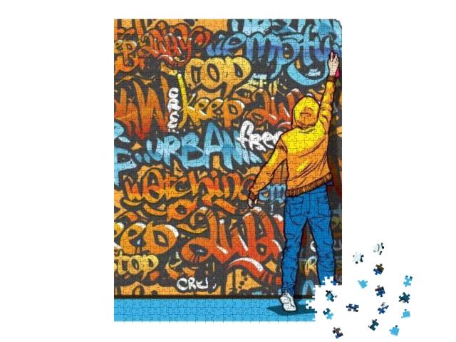 Puzzle de 1000 pièces « Jeune homme en train de faire des graffitis »