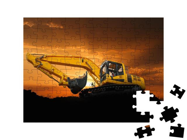 Puzzle de 100 pièces « Pelleteuse Crawler sur un chantier au coucher du soleil »