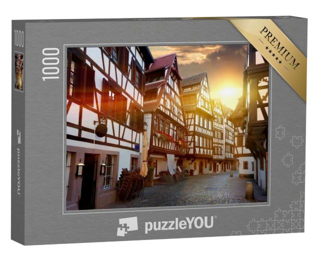Puzzle de 1000 pièces « Rue avec maisons à colombages historiques dans le quartier de la Petite France à Strasbourg, France »