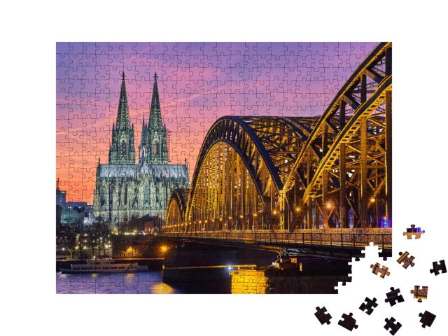 Puzzle de 500 pièces « La cathédrale de Cologne et le pont Hohenzollern au coucher du soleil »