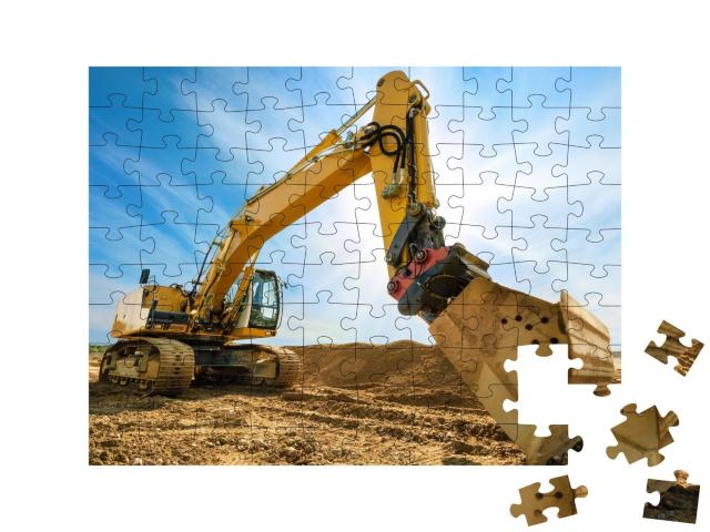 Puzzle de 100 pièces « Grande pelleteuse sur un nouveau chantier »