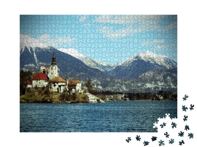 Puzzle de 1000 pièces « Église sur l'île de Bled devant des montagnes enneigées, Slovénie »