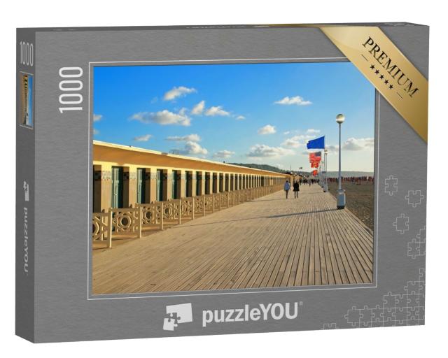 Puzzle de 1000 pièces « Les fameuses tables de Deauville sur fond de soleil couchant »