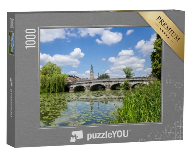 Puzzle de 1000 pièces « Pont et église de Bazoilles-sur-Meuse se reflétant dans la rivière. »