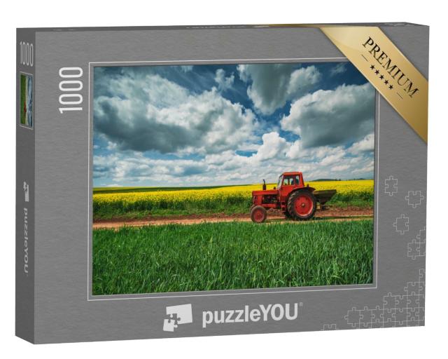 Puzzle de 1000 pièces « Tracteur rouge avec remorque devant un champ de colza, Oxfordshire »