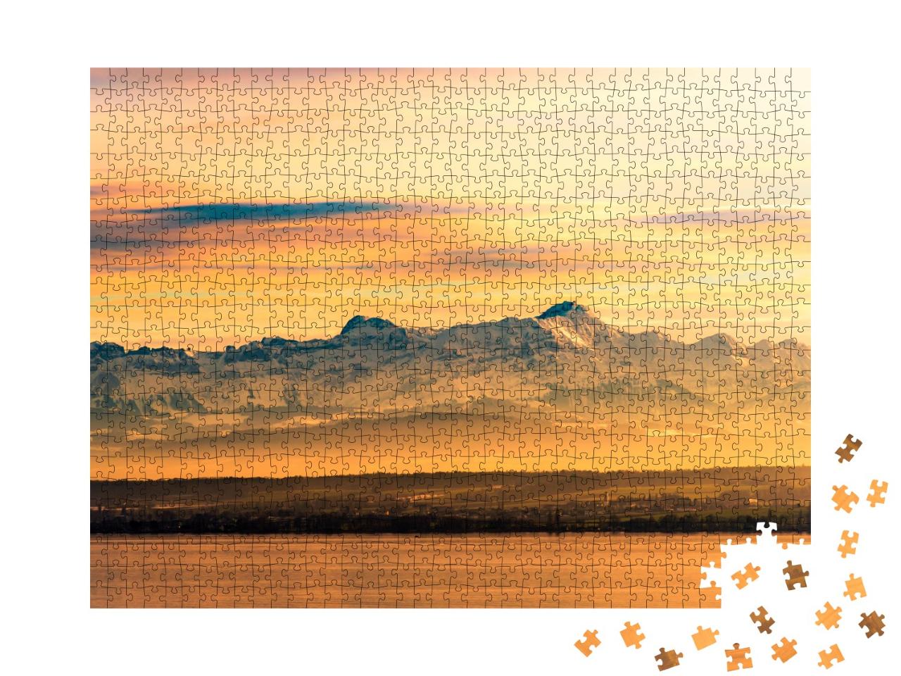 Puzzle de 1000 pièces « Lumière du soir sur le lac de Constance avec les Alpes suisses en arrière-plan »