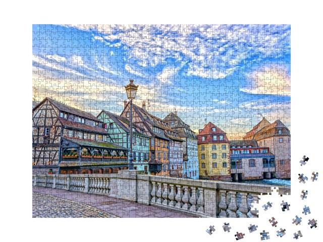 Puzzle de 1000 pièces « Maisons traditionnelles à colombages le long des canaux dans le quartier de la Petite France à Strasbourg »