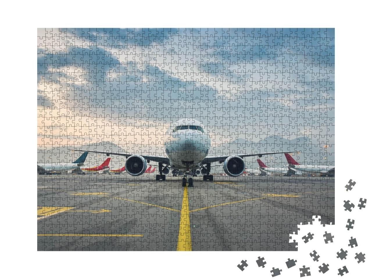 Puzzle de 1000 pièces « Avion de ligne à l'aéroport international de Hong Kong »